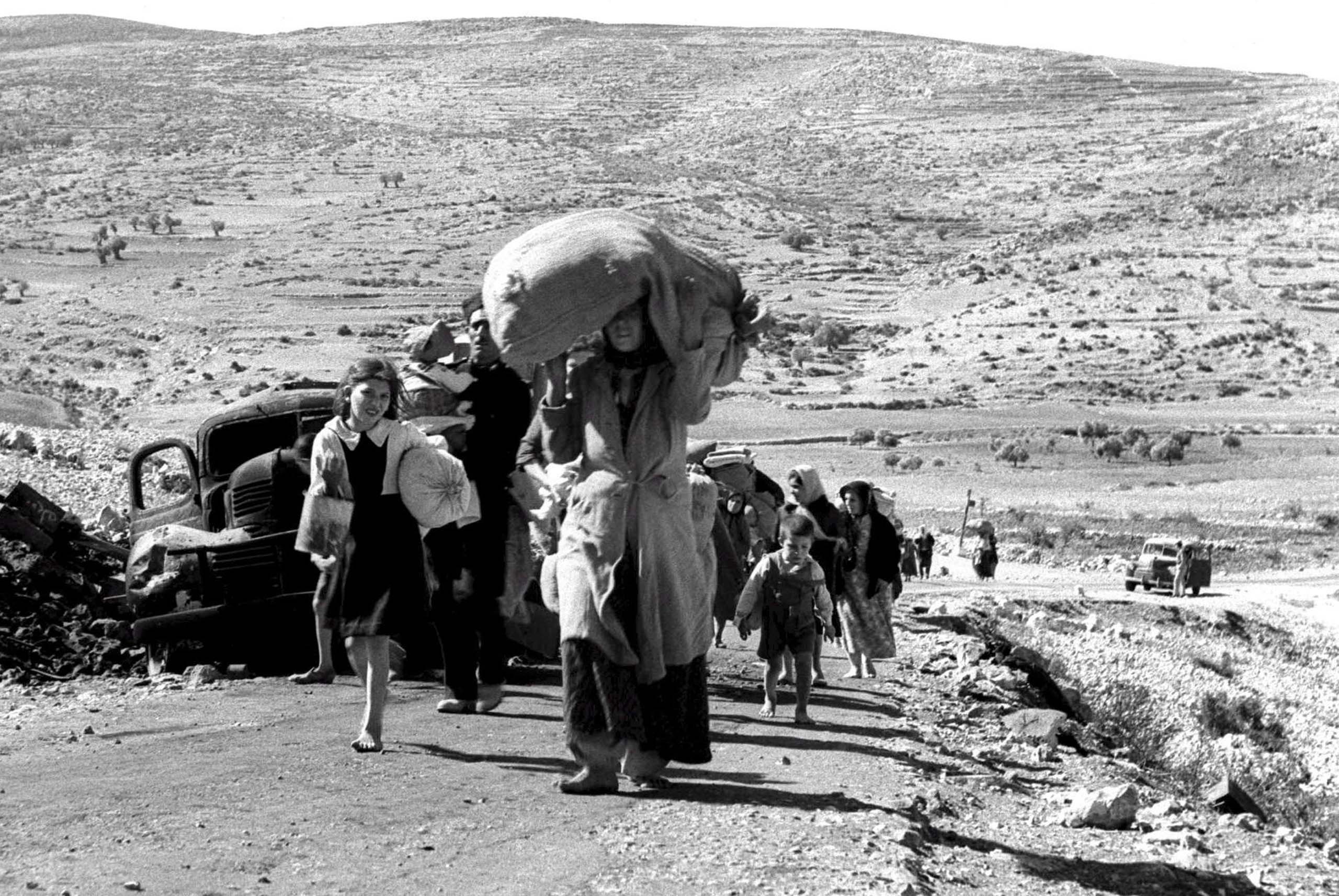 Arabs flee towards Lebanon from Galilee during War of Independence in 1948 epa01333550 An handout picture provided by the Israeli Goverment Press Office on 04 May 2008 shows Arabs fleeing with just tthe possessions they are able to carry as they make their way toward Lebanon from villages in the Galilee during Israel's 1948 War of Independence. During the 1948 war Arabs fled to Lebanon, to Jordan, into the West Bank areas, and the Gaza Strip and became refugees in what they refer to as the 'Nakba,' or the catastrophy. Israel celebrates its 60th anniversary on May 14, according to the internationally-used Gregorian calendar; on May 8, according to the Hebrew calendar. EPA/ELDAN DAVID EDITORIAL USE ONLY